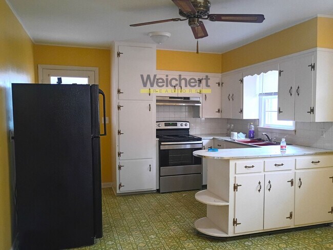 Photo - Cozy 2BR Home with Fenced Yard