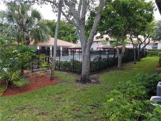 Photo - 8750 Royal Palm Blvd Unit 106