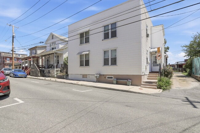 Photo - This well-maintained 4-bedroom, 2-bath duplex offers a spacious layout with all the comforts of h...