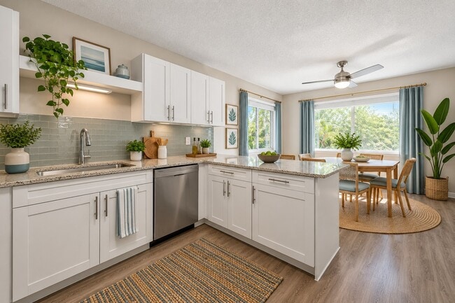 Elevate your cooking experience in the beautifully designed kitchen of Whaler's Cove, featuring modern appliances, stylish cabinetry, and ample natural light. Ideal for culinary enthusiasts and gatherings alike. Schedule your tour today!
