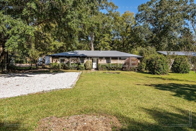 Building Photo - Updated 4 Bed 2 Bath Brick Home in West Mo...