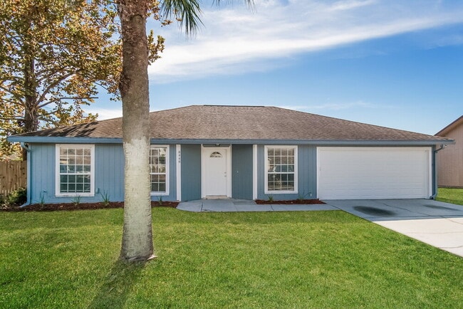 Building Photo - 8448 Pikes Peak Dr N