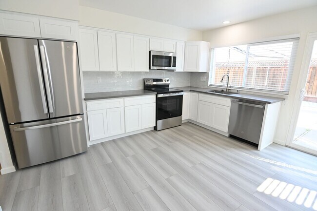 Photo - Beautiful 4-Bedroom, 2-bath, fully remodeled home in a prime location. Won’t Last Long!