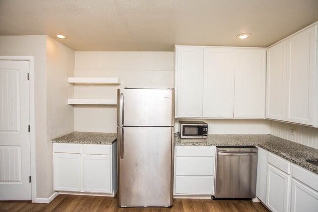 Photo - "Charming 4-Bedroom Home with Granite Touches & Gleaming Hardwood Floors in Lubbock!"