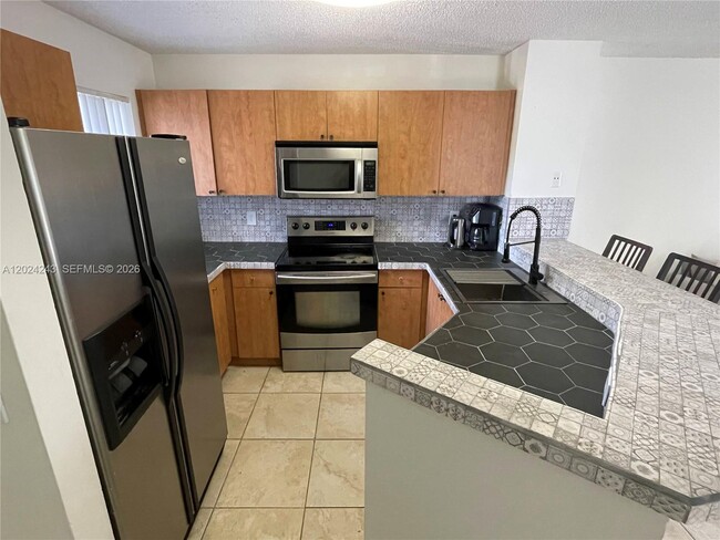 Photo - 8750 N Sherman Cir Unit 208