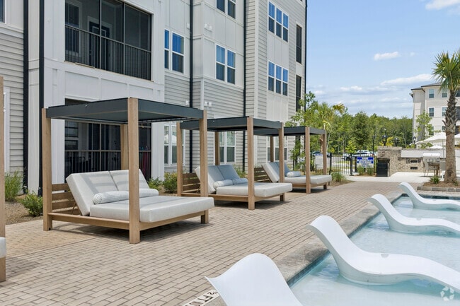 Resort-style Pool with Sunshelf & Cabanas