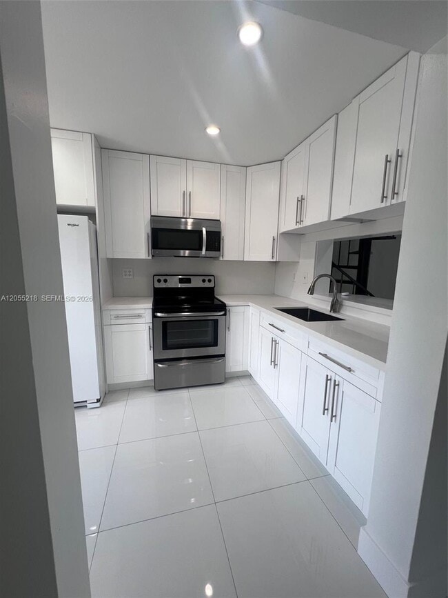 Building Photo - 13056 SW 88th Ln Unit B-206