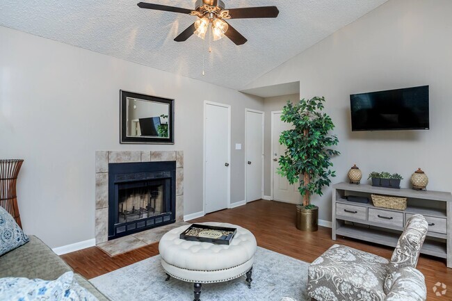 WOOD BURNING FIREPLACE IN APARTMENTS FOR RENT. - Village at Crossgates Rental