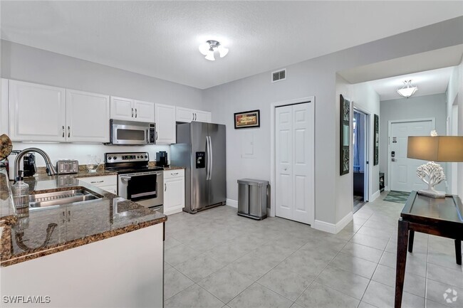 Building Photo - 10032 Heather Ln Unit 1201 Rental