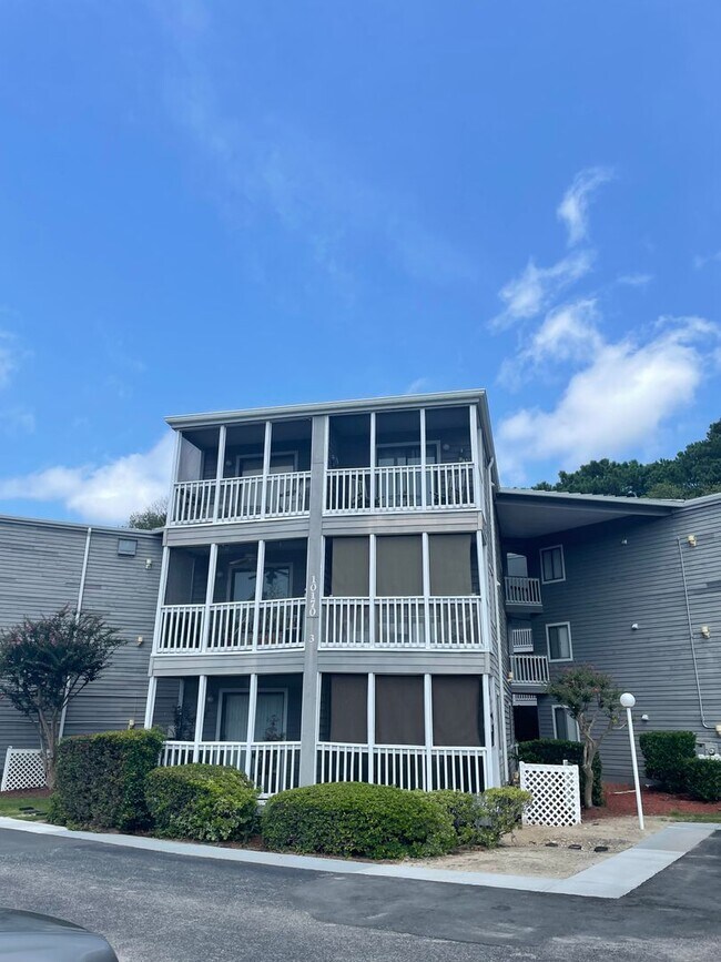 Building Photo - 10170 Beach Dr SW Unit B10170