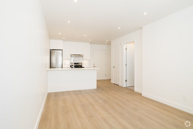 3BR, 2BA - 1200SF - Living Room - Le Cent Dix