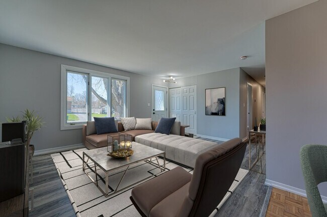 Photo - Bright & Spacious 3 Bedroom Main Floor Uni... Unit 1