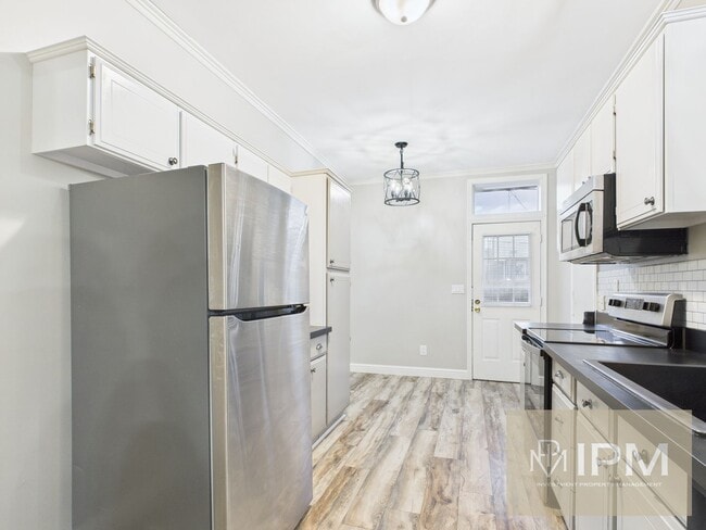 Photo - Beautiful 4 Bedroom, 1 Bath Home with Off-Street Parking!!