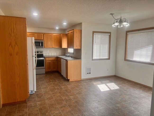 Photo - Spacious 3-Bedroom Home with Full-Size Garage & Private Backyard in Battle Ground!