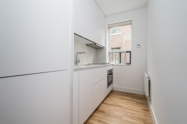 Building Photo - 1 Claude Ave Unit 202