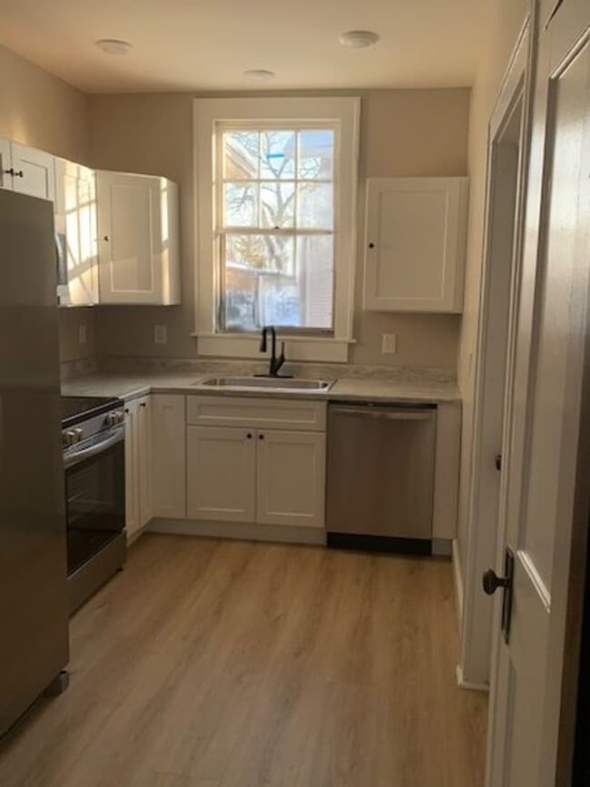 Photo - Spacious 5-Bedroom, 2-Bath Home with Class...