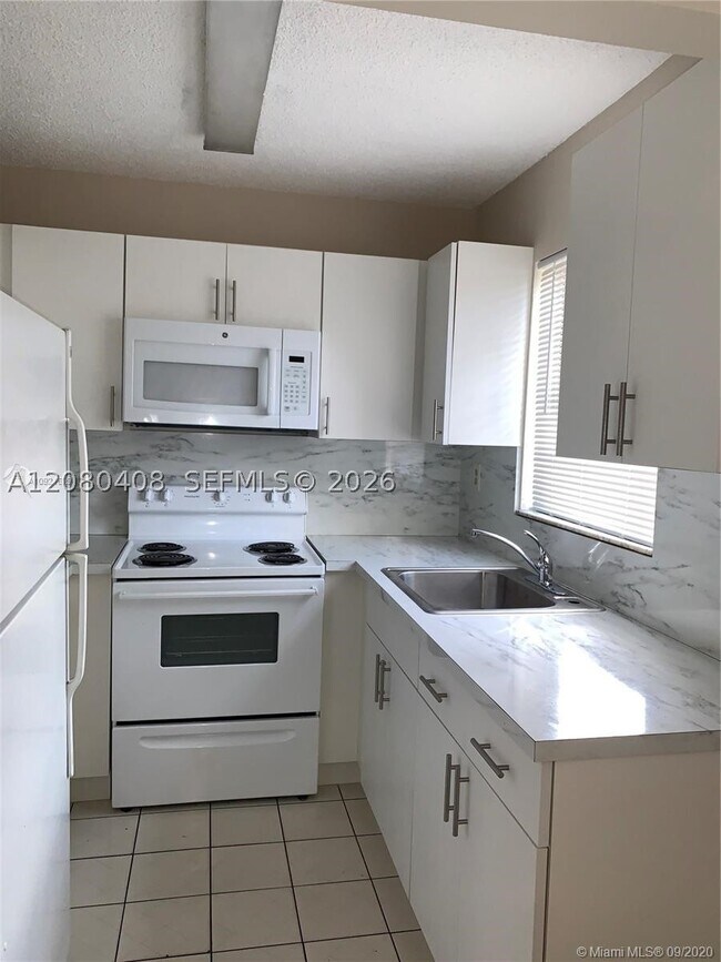 Building Photo - 5930 W 25th Ct Unit 101