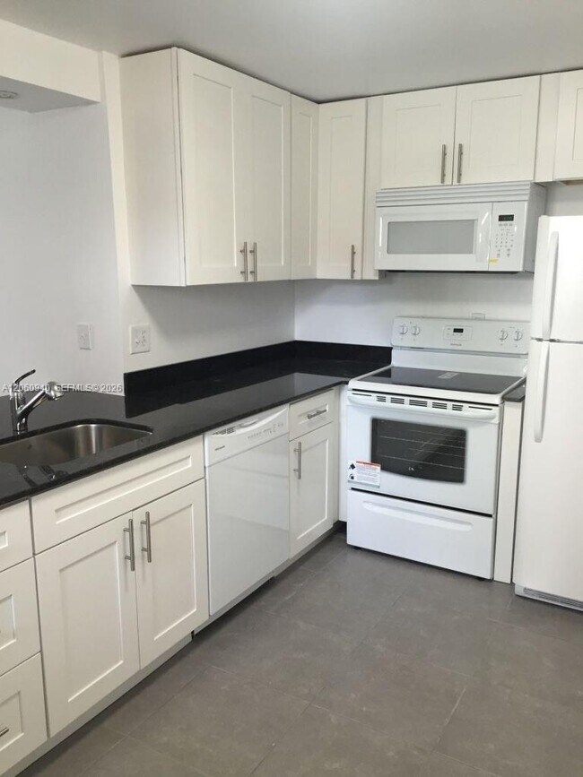 Photo - 860 NE 209th Terrace Unit 104-33