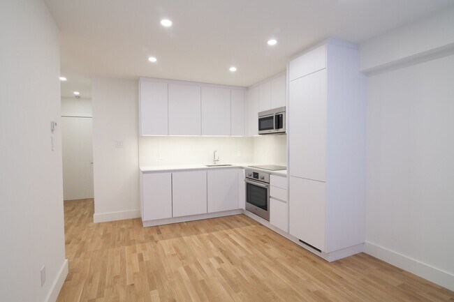 Building Photo - 4390 Grand Blvd. Unit 208