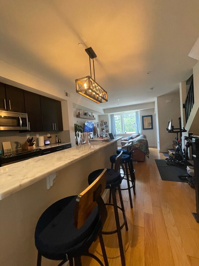 Kitchen and living room - 3215 12th St NE Condo Unit 102