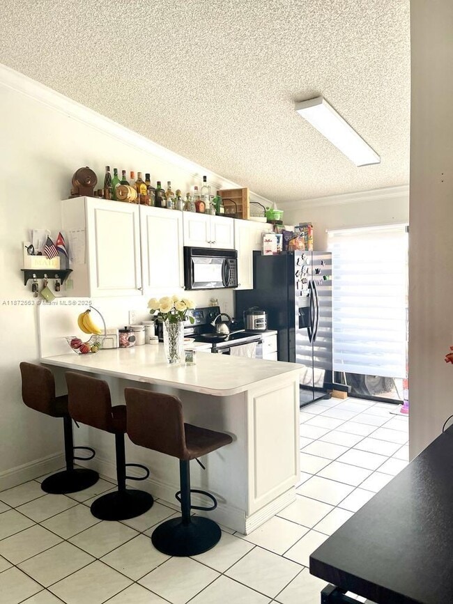 Building Photo - 7762 W 29th Way Unit 201 Rental