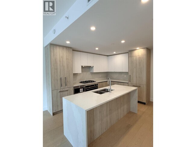 Photo - 423 6th St Unité 306