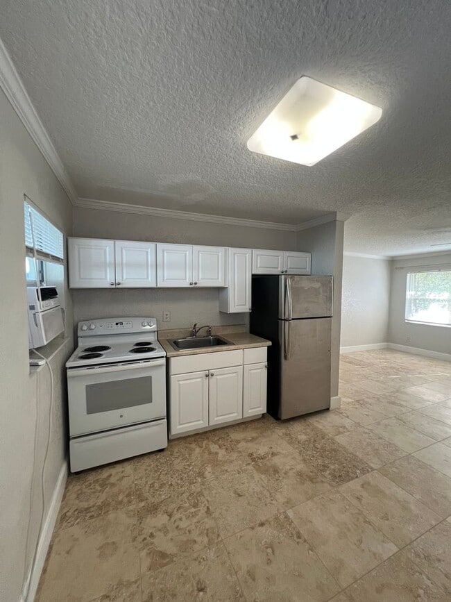 Photo - Fantastic Neptune Beach Rental - 1 block from the beach!