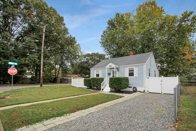 Photo - Well-Maintained Home with Spacious Yard and Screened Porch