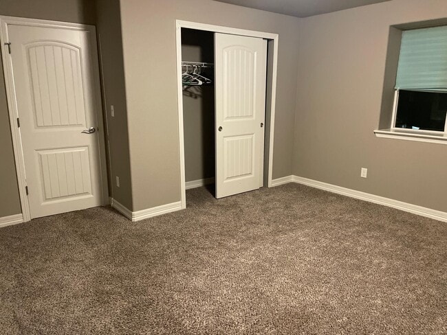 1st bedroom closet - 5383 Homeward Dr