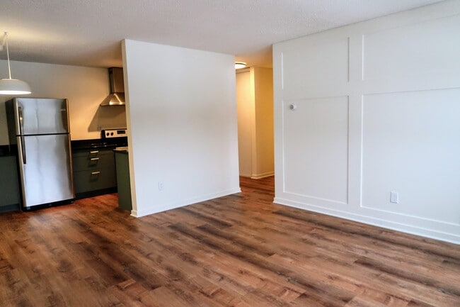 Living room to kitchen - 2616 Harriet Ave S #203 Unit 203