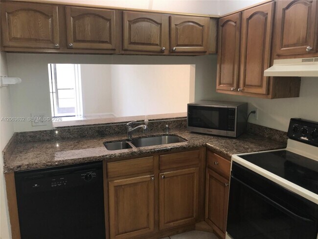 Photo - 6796 Palmetto Cir S Unit 101