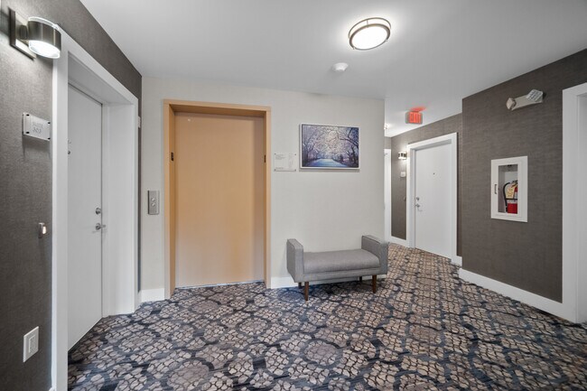 Elevator in Hallway - 50 Six Calvert Apartments