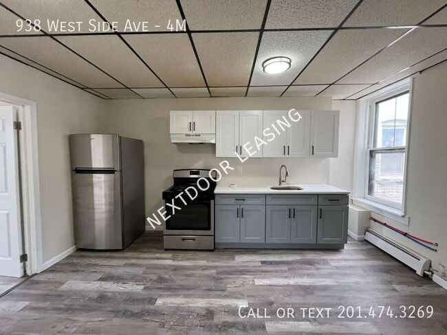 Building Photo - 938 West Side Ave Unit 4M