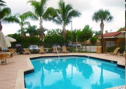Sparkling Swimming Pool with Expansive Sundeck