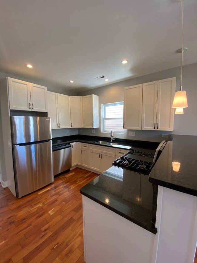 Building Photo - 3633 W Palmer St Unit 2