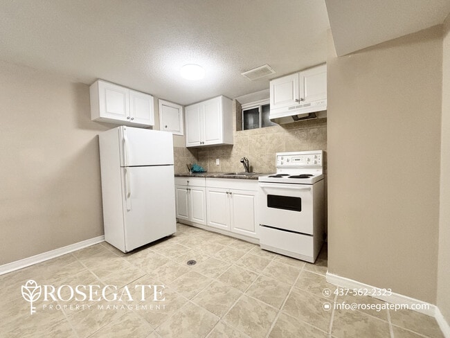 Building Photo - Pet-Friendly 2-Bedroom Corner Basement Apartment with Backyard – Hamilton Unit 2