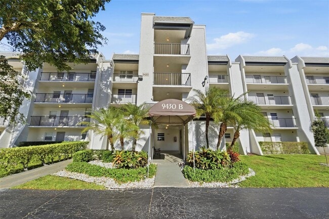 Building Photo - 9430 Poinciana Pl Unit 409