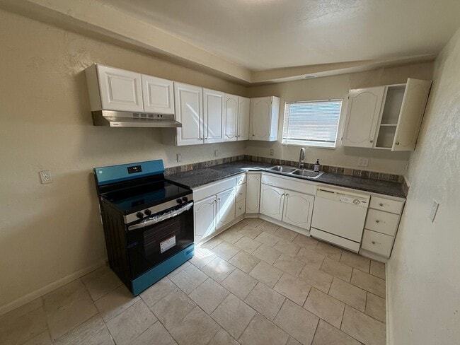 Photo - 4 bed , 1.5 bath , inside laundry, fenced yard, ceramic flooring throughout!