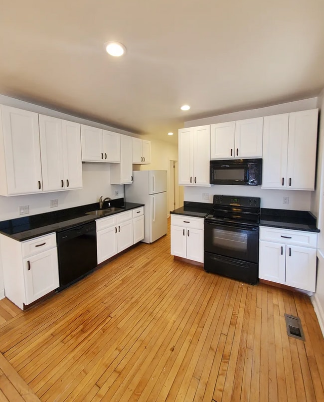 Kitchen with Dishwasher - 526 E Burleigh St Apartments Unit Lower