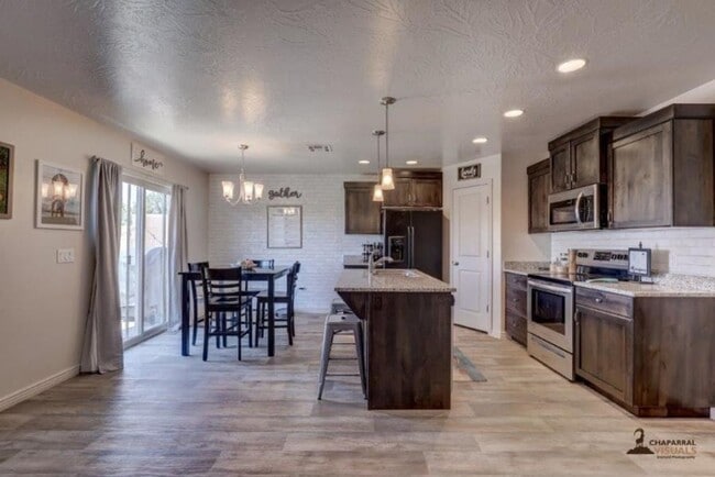 Photo - Pet Friendly: 3 Bedroom Fossil Hills Townhome With 2 Car Garage