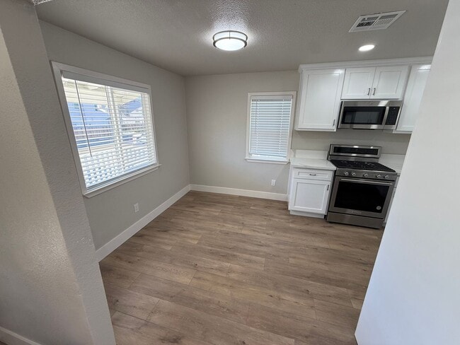 Photo - 3 Bed| 2 Bath | 1153 SF | Private Driveway | Single Story | Tenant pays $175 monthly for WS&G