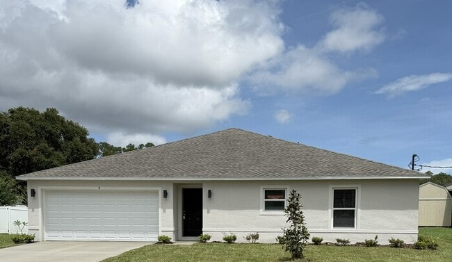 Building Photo - STUNNING BRAND NEW 4/2 HOME IN PALM COAST