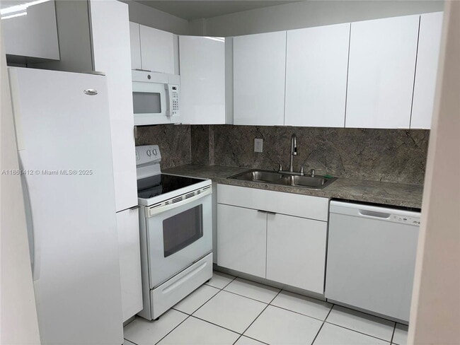 Photo - 5050 NW 7th St Unidad PH1