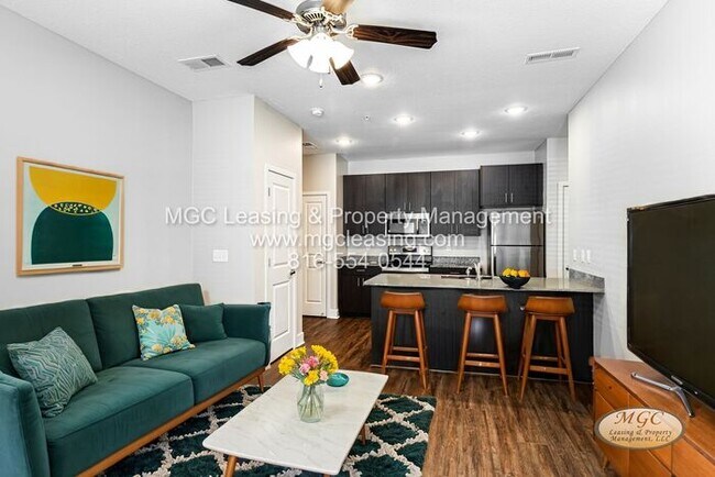 Photo - Ground-Level Comfort Meets Elevated Outdoo...