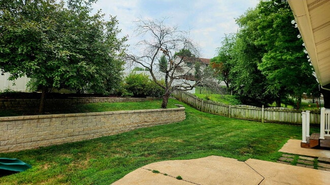 Photo - "Charming 3-Bed Oasis with 2.5 Baths on Carrington Court!"