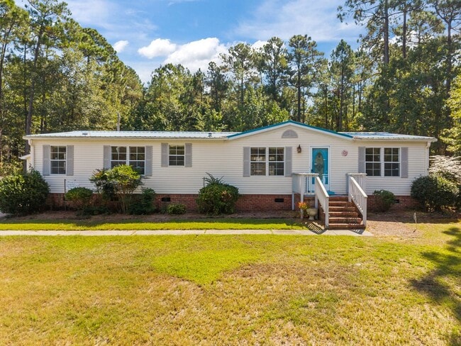 Building Photo - 4 bedroom 2 bathroom spacious home!