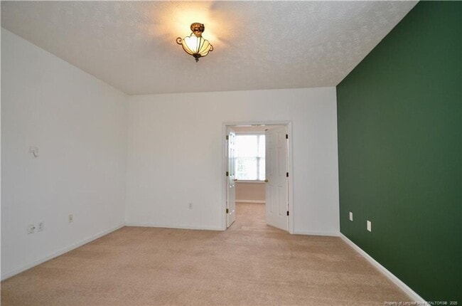 Photo - Well maintained 2nd-story condo