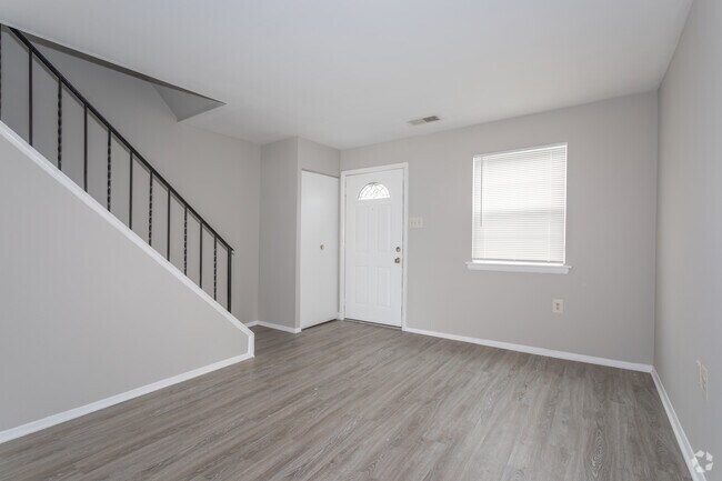 Townhouse - 2 BR, 1 BA - 906 Sq. Ft.