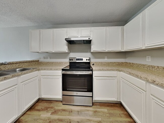 Photo - Charming 3BR Home for Rent in Hillside Heights, Dallas TX | Vaulted Ceilings | 2-Car Garage | Pet...