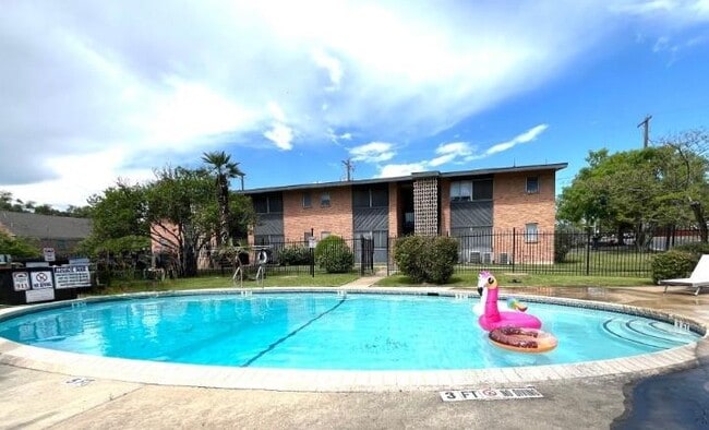 Building Photo - 3304 Red River St Unit 102